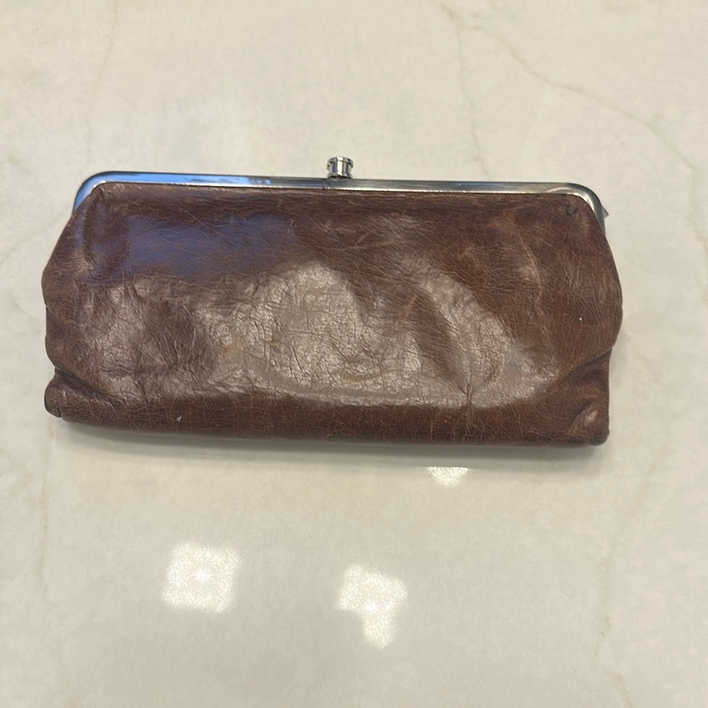 Hobo wallet. Brown leather. Good condition/ used.